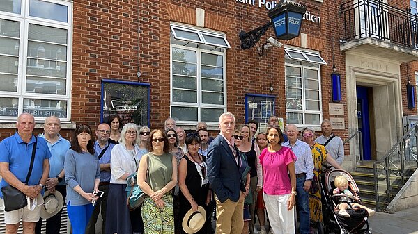 Munira Wilson MP, Gareth Roberts AM and local councillors in front of Twickenham Police Station